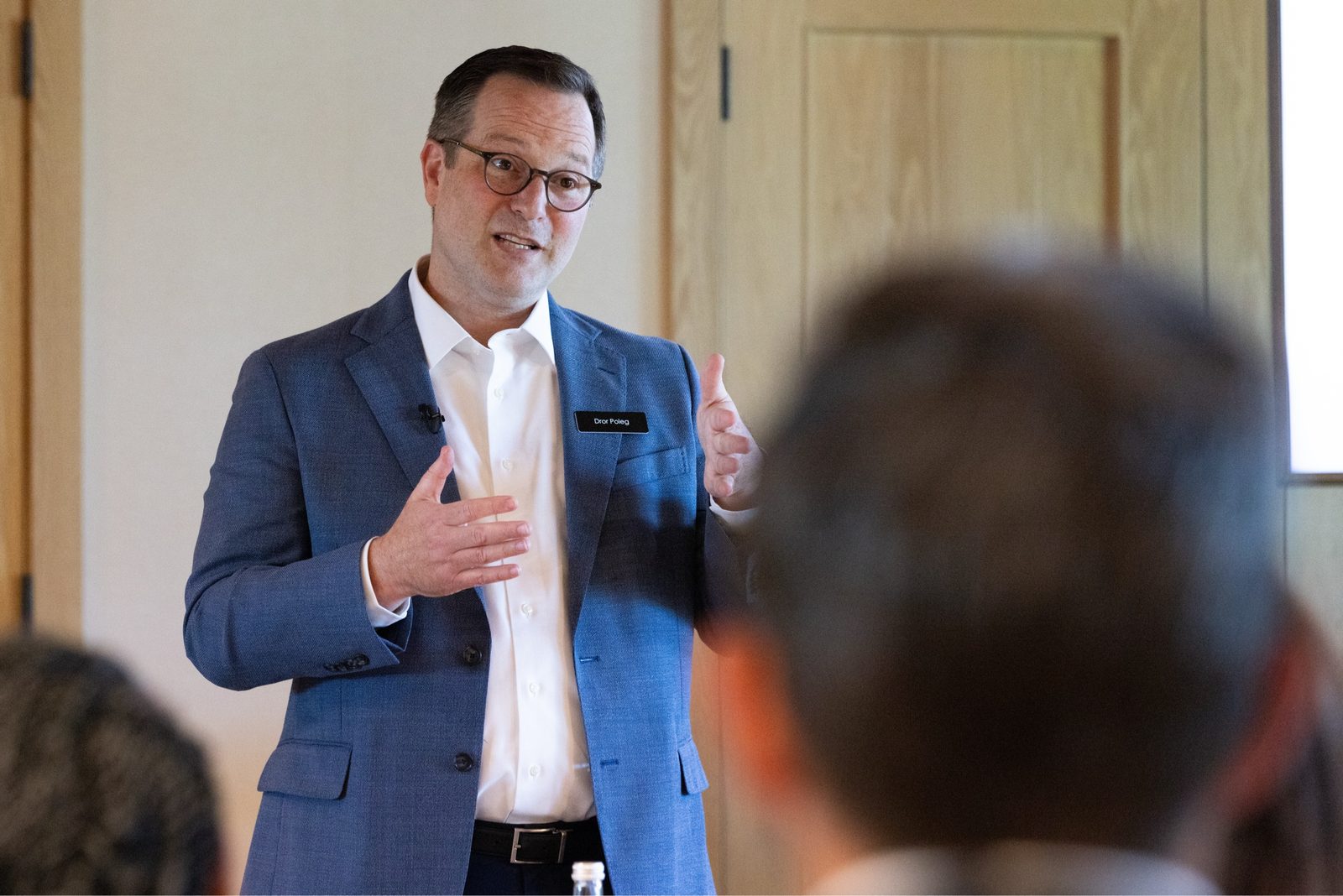 Dror Poleg speaking to a room at the WeWork Real Estate Summit.